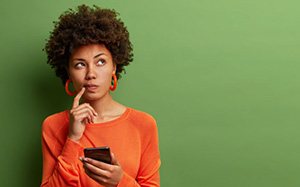 Lady considers something