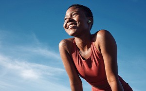 Lady smiles outdoors