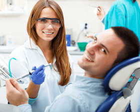 Man smiling in dental chair