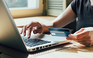 Woman using a credit card