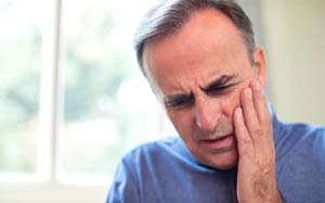 Emergency dentist in Bothell speaking with a patient