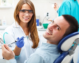 Smiling man in dental chair