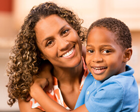 mother and son smiling