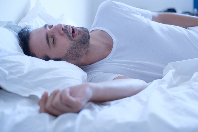 a man sleeping with his mouth open