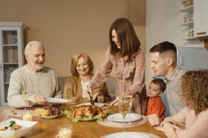 Family eating Thanksgiving dinner
