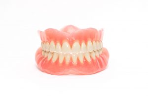 Set of dentures photographed on a white background