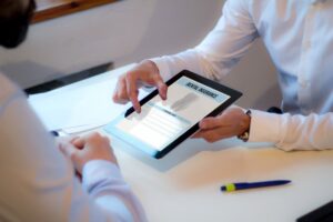 Patient looking at dental insurance form.