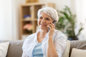 Smiling senior woman talking on the phone